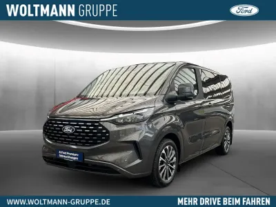 Gebraucht Ford Tourneo Custom Titanium X 170 PS (125 kW) 2025 Magneticgrau (metallic) Van