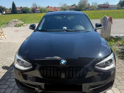 Gebraucht BMW 118 Sport Line 170 PS (125 kW) 2012 Schwarz Kleinwagen