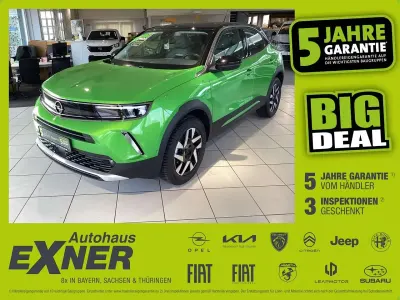 Gebraucht Opel Mokka Elegance 136 PS (100 kW) 2023 Matcha green / dach schwarz SUV