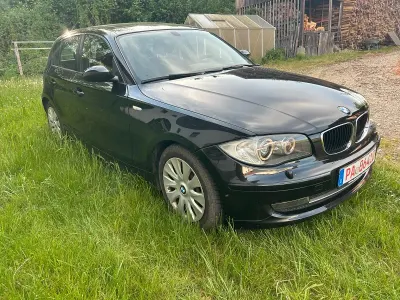 Gebraucht BMW 116 122 PS (89 kW) 2009 Schwarz Kleinwagen