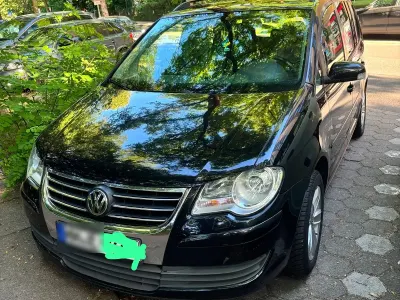 Gebraucht VW Touran 105 PS (77 kW) 2009 Schwarz Van / Kleinbus