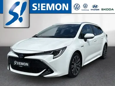 Gebraucht Toyota Corolla Hybrid Club 152 PS (111 kW) 2019 Pure) white ii (weiss Kombi
