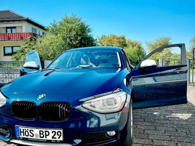 Używany BMW 116 Urban Line 136 KM (100 kW) 2011 Niebieski Hatchback