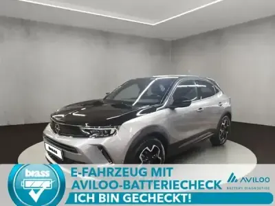 Gebraucht Opel Mokka-e Ultimate 100 kW (136 PS) 2022 Quarz silber (metallic) SUV