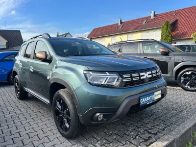 Gebraucht Dacia Duster Extreme 114 PS (83 kW) 2024 Zedergrün SUV