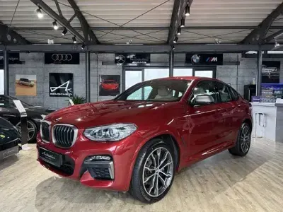 Gebraucht BMW X4 Performance 340 PS (250 kW) 2021 Flamencorot brillanteffekt met SUV
