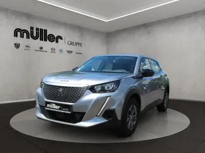 Gebraucht Peugeot e-2008 Active 100 kW (136 PS) 2022 Artense grau SUV