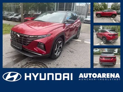 Gebraucht Hyundai Tucson Trend 265 PS (194 kW) 2022 Sunset red / phantom black / m SUV