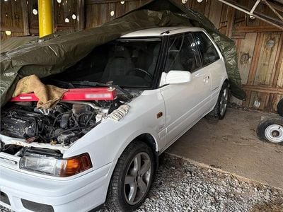 Second-hand Mazda 323 163 CP (119 kW) 1991 Alb Hatchback