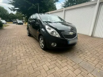 Gebraucht Chevrolet Spark 82 PS (60 kW) 2011 Schwarz Kleinwagen