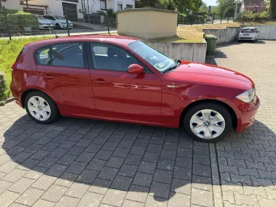 Gebraucht BMW 116 122 PS (89 kW) 2008 Rot Kleinwagen