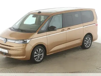 Używany VW Multivan Style 204 KM (150 kW) 2022 Pomarańczowy Minivan