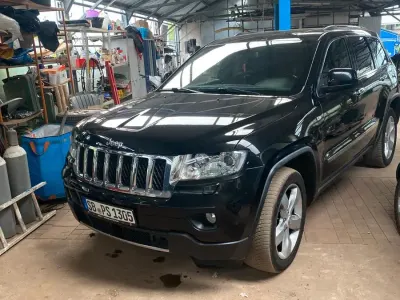 Gebraucht Jeep Grand Cherokee Overland 235 PS (172 kW) 2012 Schwarz SUV