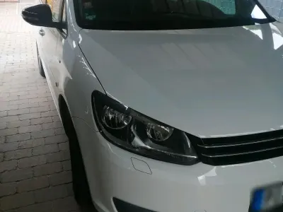 Gebraucht VW Touran 105 PS (77 kW) 2012 Weiß Van / Kleinbus
