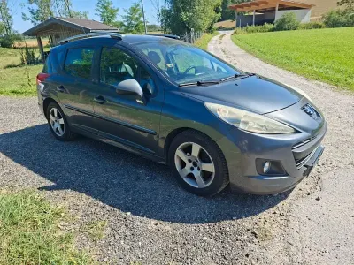 Gebraucht Peugeot 207 Premium 111 PS (81 kW) 2012 Grau Kombi