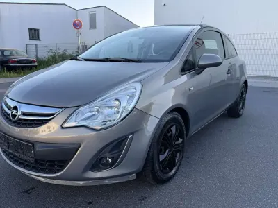Gebraucht Opel Corsa Basis 60 PS (44 kW) 2011 Magma rot (b) Kleinwagen