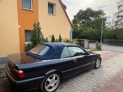 Gebraucht BMW 320 Cabriolet Basis 150 PS (110 kW) 1995 Violet Cabrio