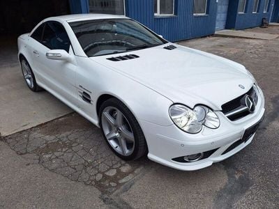Second-hand Mercedes SL55 AMG AMG 517 CP (380 kW) 2006 Alb Cabrio