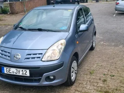 Gebraucht Nissan Pixo 68 PS (50 kW) 2012 Grau Kleinwagen