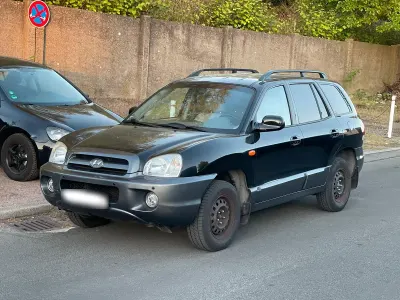 Second-hand Hyundai Santa Fe GLS 146 CP (107 kW) 2005 Negru SUV