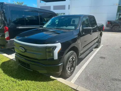 Gebraucht Ford F-150 XLT 336 kW (458 PS) 2023 Agate black metallic Pickup