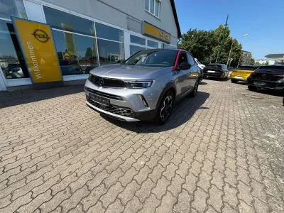 Gebraucht Opel Mokka GS Line 131 PS (96 kW) 2021 Kontrast grau/quarz silber SUV