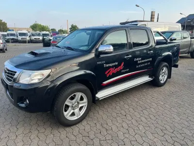 Używany Toyota HiLux 144 KM (105 kW) 2013 Czarny Pickup