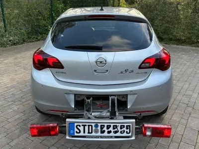 Second-hand Opel Astra 95 CP (69 kW) 2012 Argintiu Berlinǎ