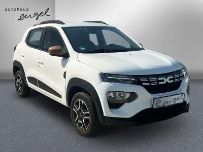 Gebraucht Dacia Spring Extreme 47 kW (65 PS) 2023 Polarweiss Kleinwagen