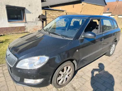 Używany Skoda Fabia 86 KM (63 kW) 2010 Czarny Kombi
