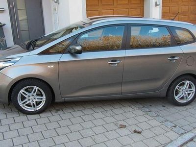 Gebraucht Kia Carens Edition 7 136 PS (100 kW) 2013 Braun Van / Kleinbus