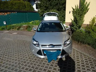 Second-hand Ford Focus Titanium 150 CP (110 kW) 2011 Argintiu Berlinǎ