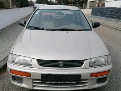 Second-hand Mazda 323 88 CP (64 kW) 1996 Bej Berlinǎ