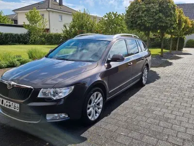Używany Skoda Superb Elegance 140 KM (102 kW) 2010 Brązowy Kombi