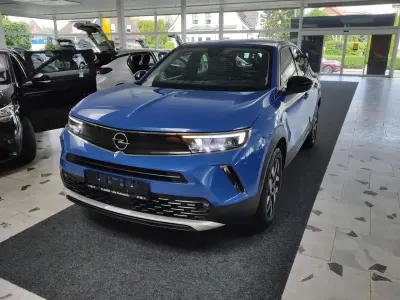 Gebraucht Opel Mokka-e Elegance 100 kW (136 PS) 2022 Perl blau/voltaik blau SUV