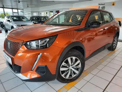 Gebraucht Peugeot e-2008 Active 100 kW (136 PS) 2023 Orange SUV