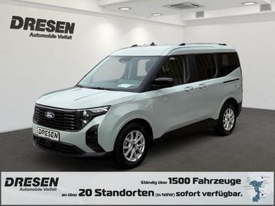 Grau Gebraucht 2024 Ford Tourneo Courier Titanium Van / Kleinbus | 23.990 € (Fairer Preis)