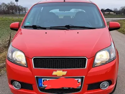 Gebraucht Chevrolet Aveo LT 101 PS (74 kW) 2011 Rot Limousine