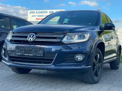 Używany VW Tiguan Sport 140 KM (102 kW) 2014 Niebieski SUV