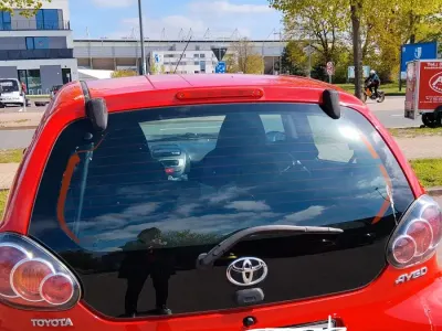 Używany Toyota Aygo 68 KM (50 kW) 2014 Czerwony Hatchback