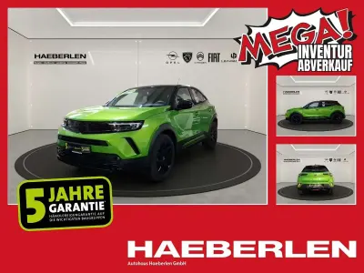 Gebraucht Opel Mokka GS Line 131 PS (96 kW) 2023 Matcha green/ikone gruen (metallic) SUV