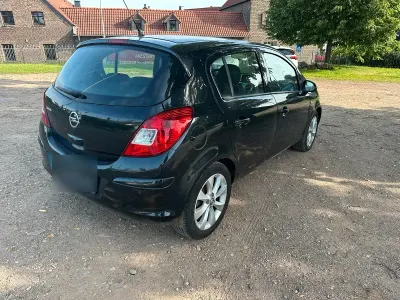 Gebraucht Opel Corsa Active 87 PS (63 kW) 2013 Schwarz Kleinwagen