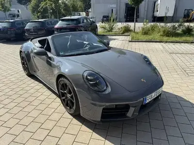 Gebraucht Porsche 992 394 PS (289 kW) 2024 Sonderlackierung schiefe... Cabrio