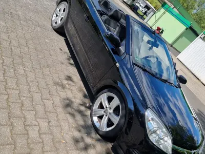 Używany Opel Astra Cabriolet 140 KM (102 kW) 2009 Czarny Kabriolet