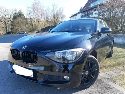 Usado BMW 114 102 CV (75 kW) 2013 Negro Utilitario