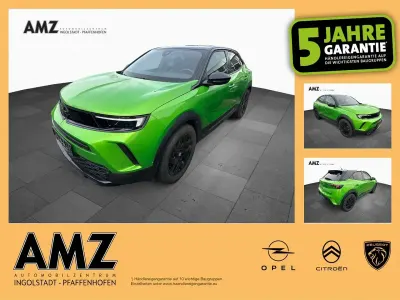 Gebraucht Opel Mokka-e GS Line 100 kW (136 PS) 2022 Matcha green/ikone gruen SUV