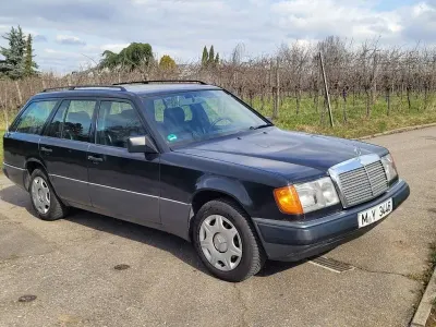 Używany Mercedes E230 132 KM (97 kW) 1991 Szary Sedan/Limuzyna