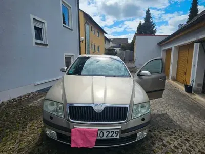 Używany Skoda Octavia Ambiente 116 KM (85 kW) 2004 Beżowy Sedan/Limuzyna