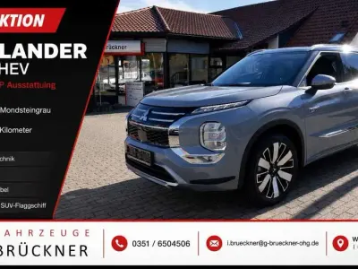 Gebraucht Mitsubishi Outlander P-HEV Top 306 PS (225 kW) 2025 Mondsteingrau / pantherschwa SUV