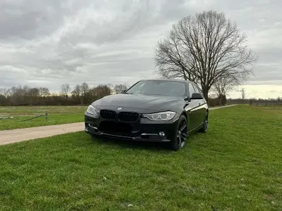 Second-hand BMW 330 Sport Line 258 CP (189 kW) 2014 Negru Break